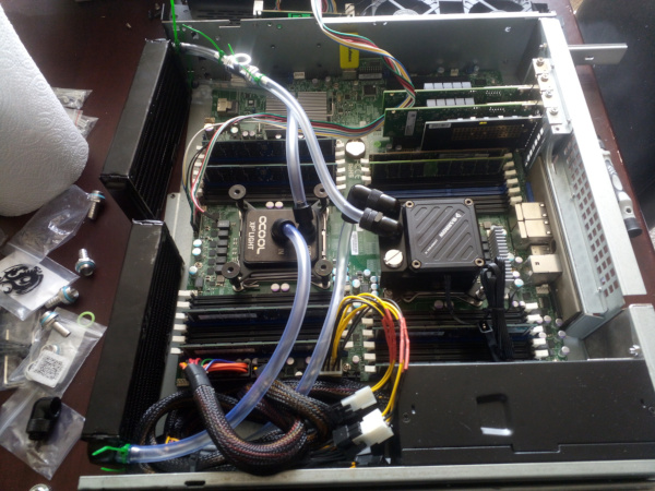 Server with fully connected water cooling loop